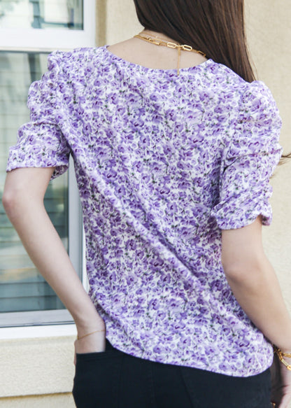 Camisa con escote en V y mangas fruncidas