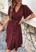 Solid Surplice Neck Button Detail Dress