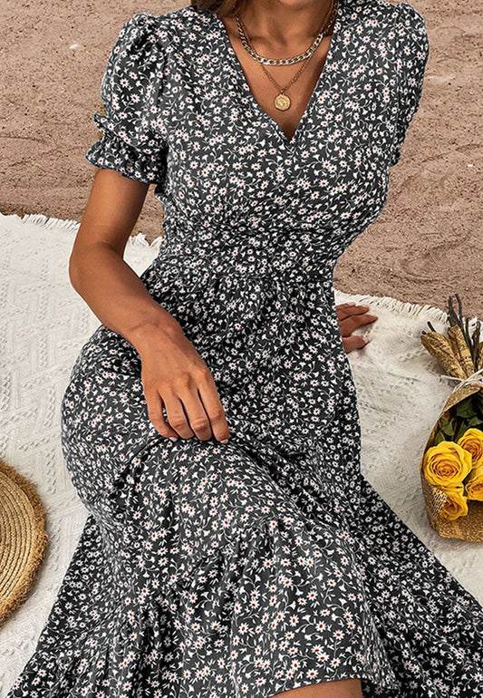 Vestido midi con escote en V y dobladillo con volantes
