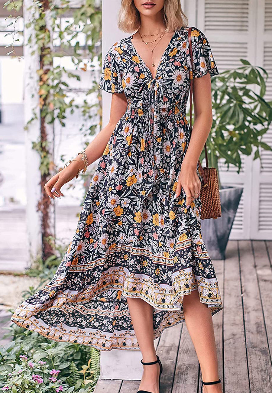 Vestido bohemio con lazo en la parte delantera, corte alto y bajo