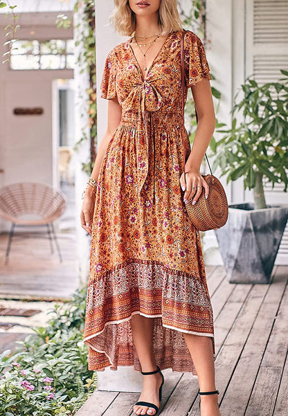 Vestido bohemio con lazo en la parte delantera, corte alto y bajo