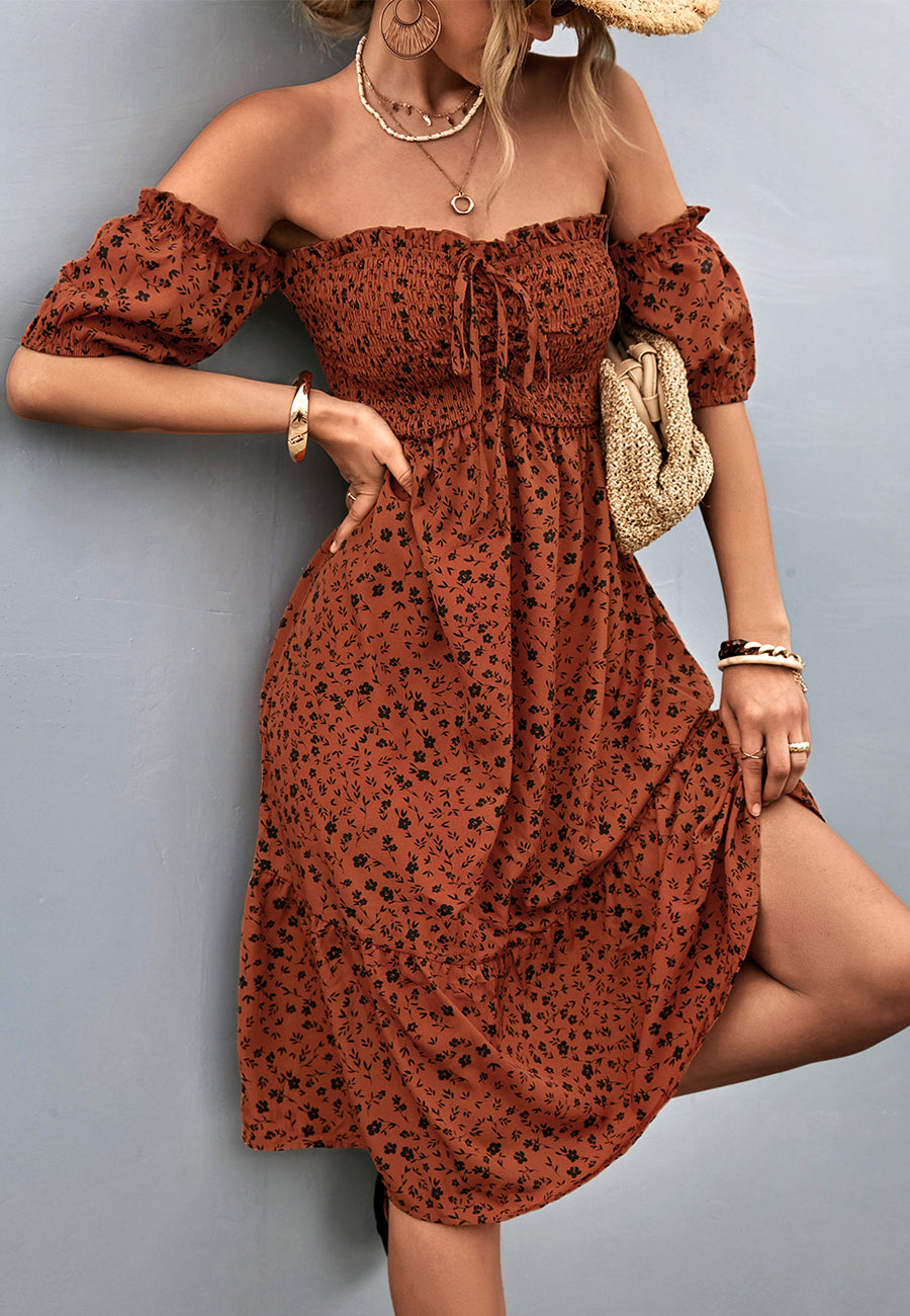 Vestido floral con hombros descubiertos y mangas abullonadas