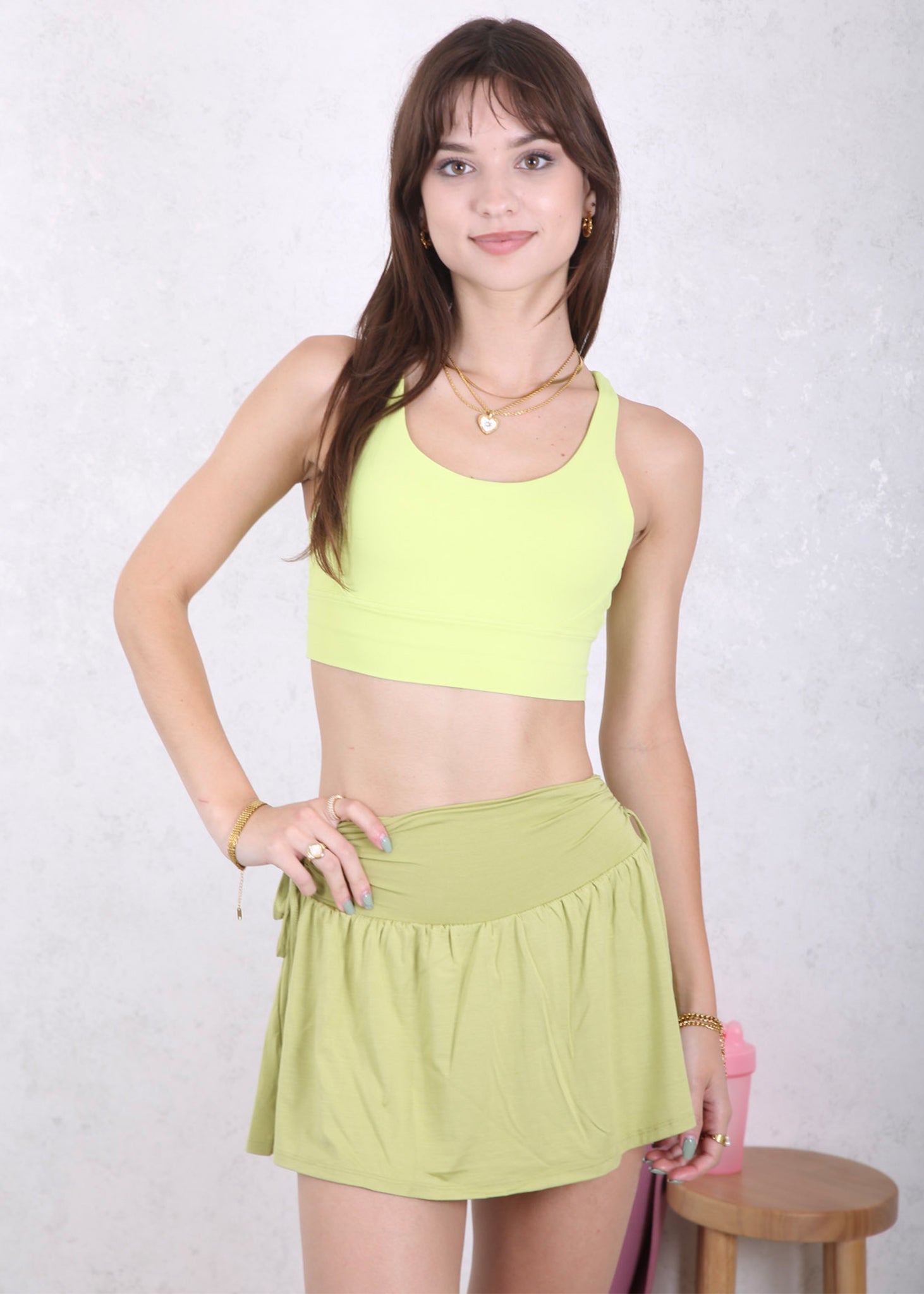 Falda deportiva con lazo y frunces laterales