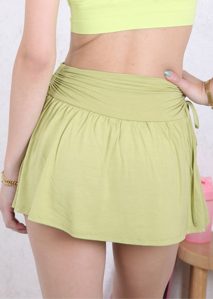 Falda deportiva con lazo y frunces laterales