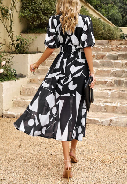 Vestido abullonado estampado con escote pronunciado