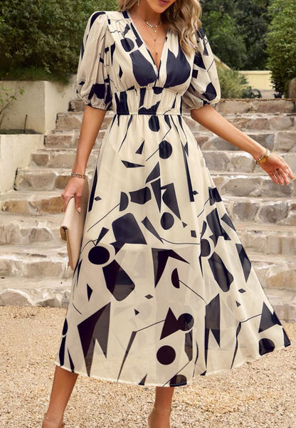 Vestido abullonado estampado con escote pronunciado