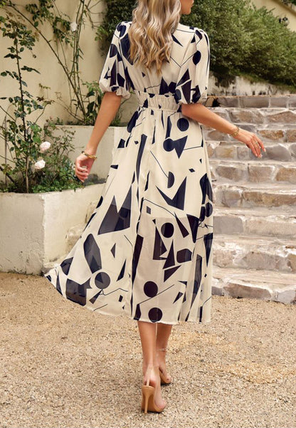 Vestido abullonado estampado con escote pronunciado