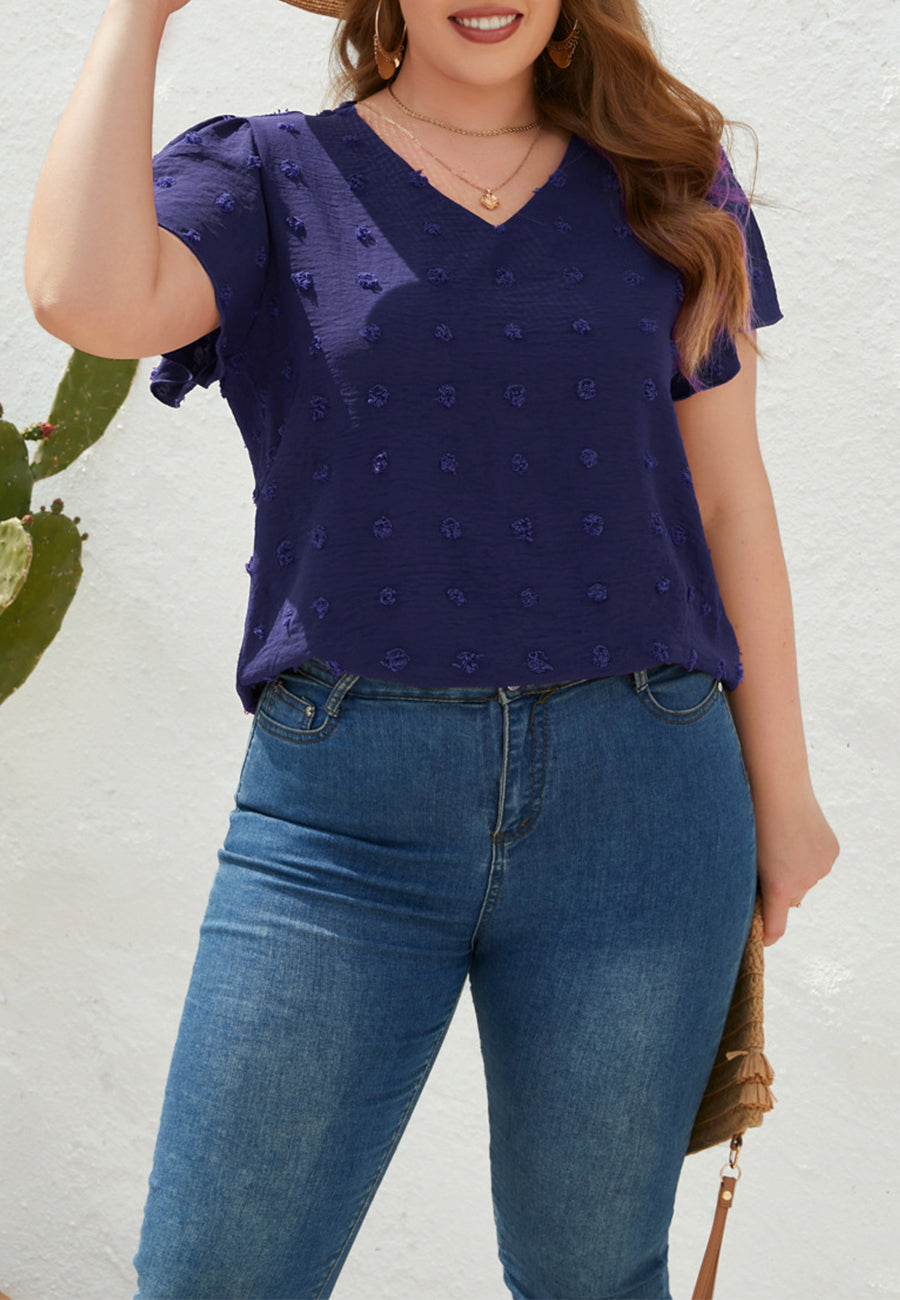 Blusa de lunares suizos con cuello en V y talla grande