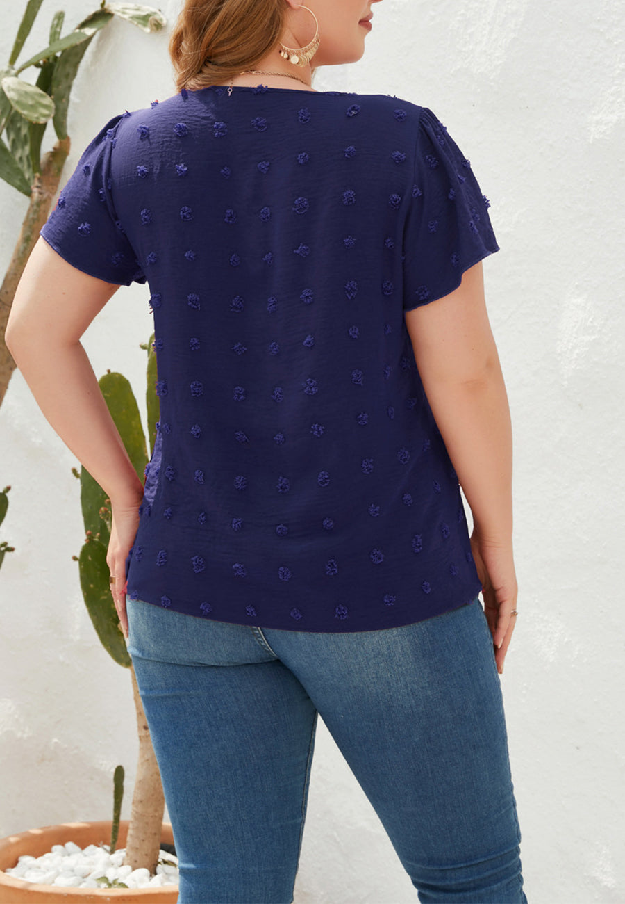 Blusa de lunares suizos con cuello en V y talla grande