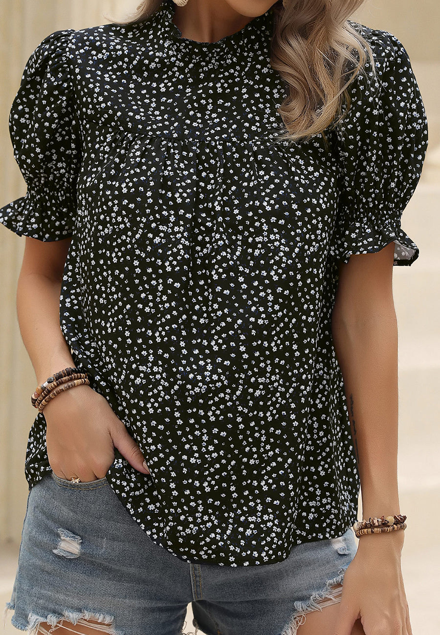 Blusa con escote con volantes y abertura en la espalda