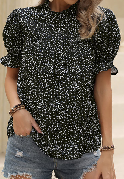 Blusa con escote con volantes y abertura en la espalda