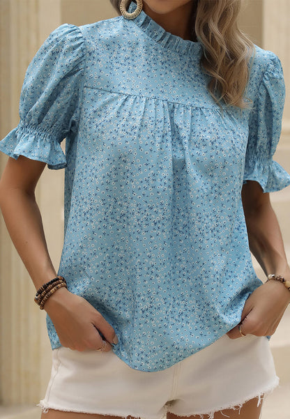 Blusa con escote con volantes y abertura en la espalda