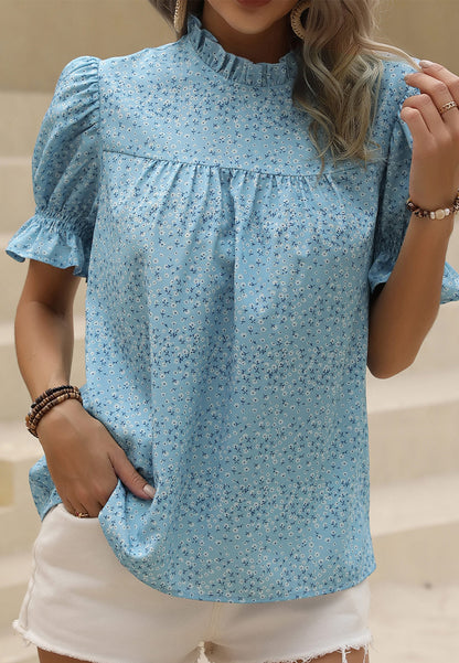 Blusa con escote con volantes y abertura en la espalda