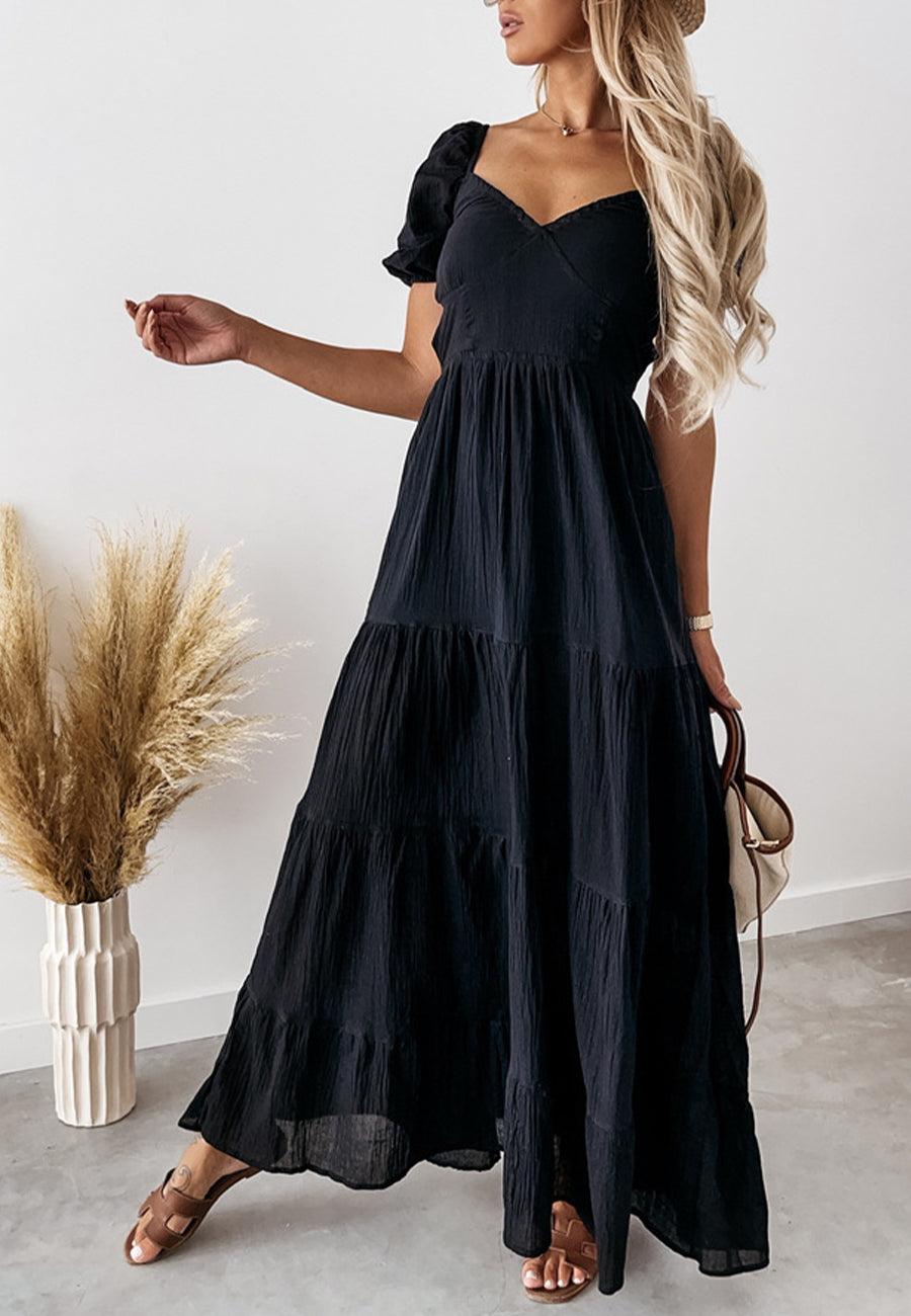 Vestido largo con doble lazo en la espalda
