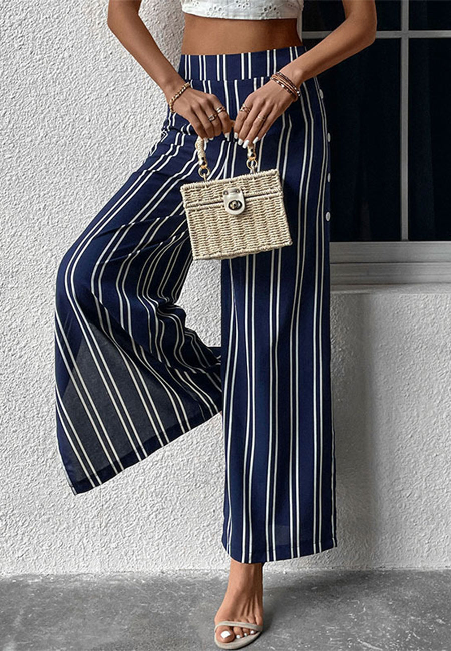 Pantalones con aberturas laterales y estampado de rayas