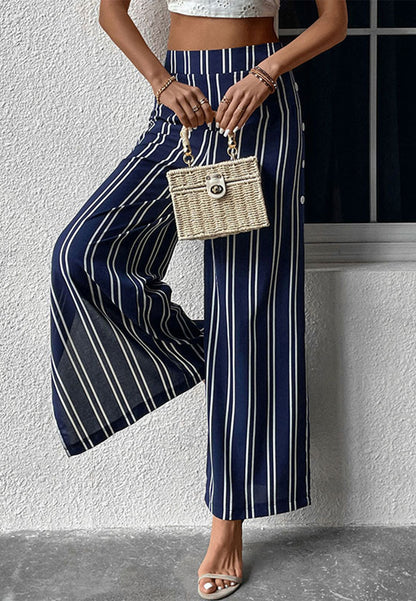 Pantalones con aberturas laterales y estampado de rayas