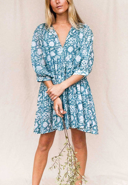 Vestido plisado con mangas dolman y estampado floral