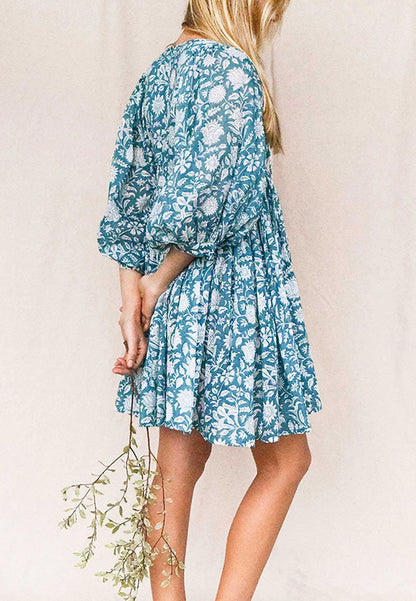 Vestido plisado con mangas dolman y estampado floral