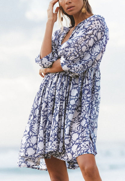 Vestido plisado con mangas dolman y estampado floral