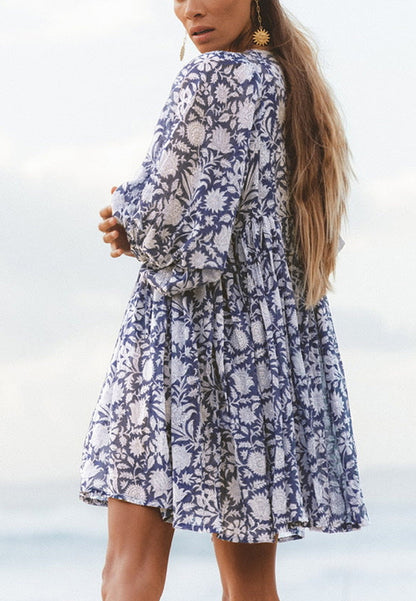 Vestido plisado con mangas dolman y estampado floral
