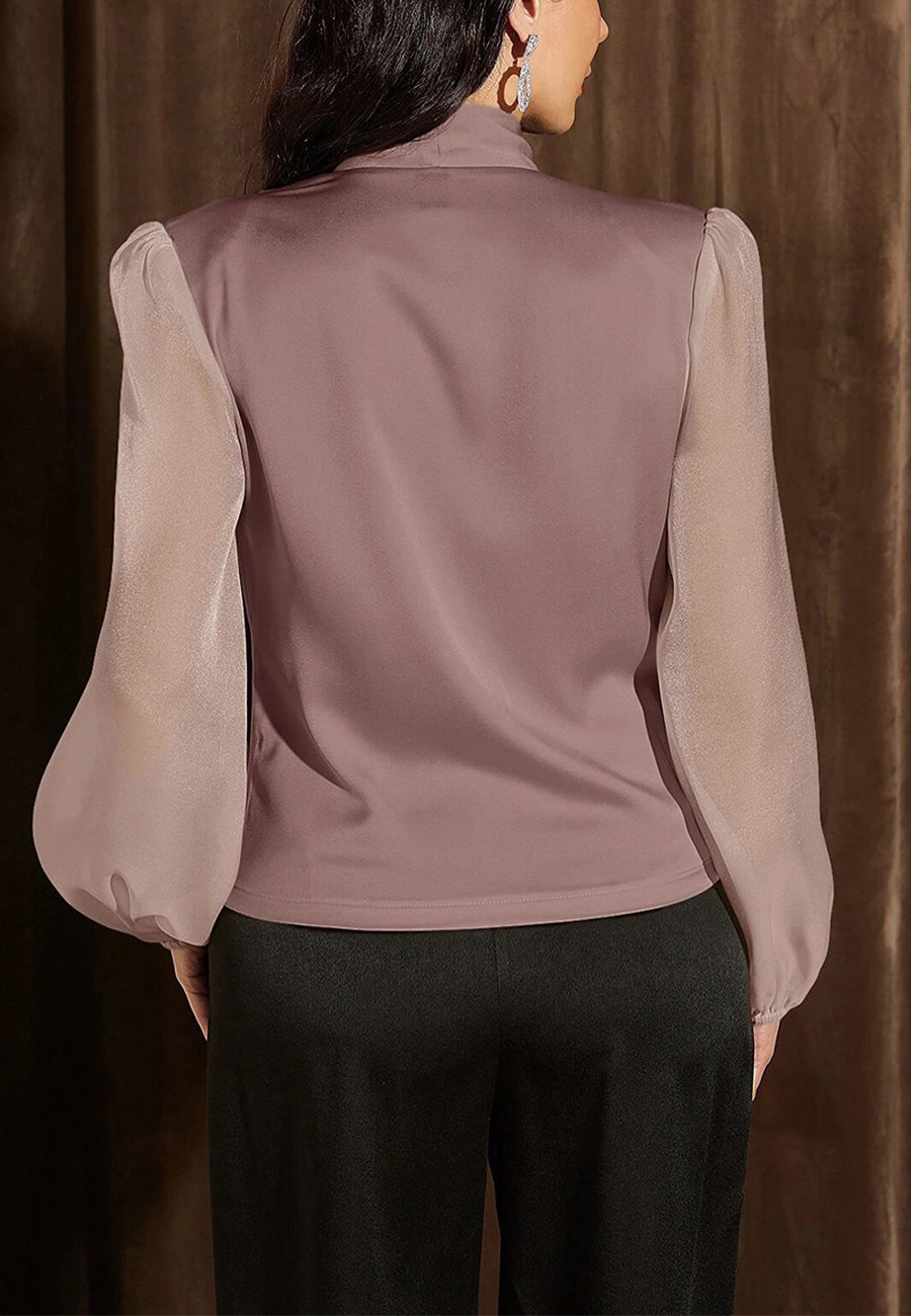 Blusa cruzada con mangas de obispo transparente