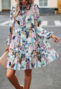 Vestido de manga larga con capas y estampado abstracto