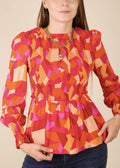 Blusa peplum con estampado floral fruncido