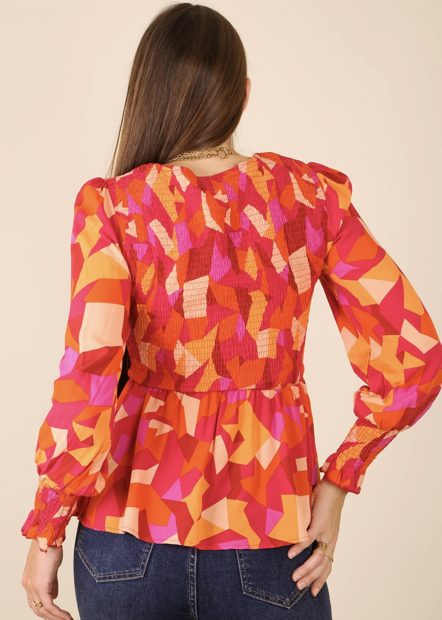 Blusa peplum con estampado floral fruncido