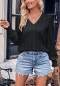 Blusa con puños fruncidos y ojales