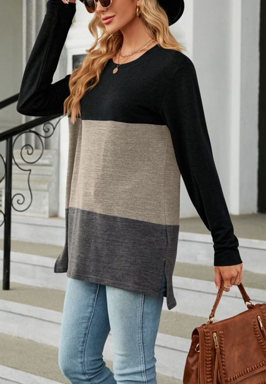 Suéter largo con aberturas laterales y diseño de bloques de color