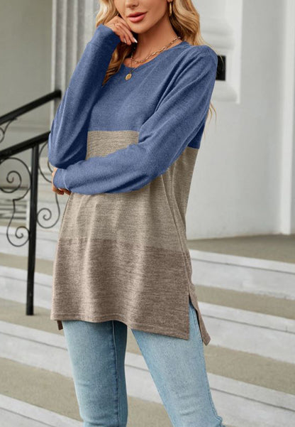 Suéter largo con aberturas laterales y diseño de bloques de color