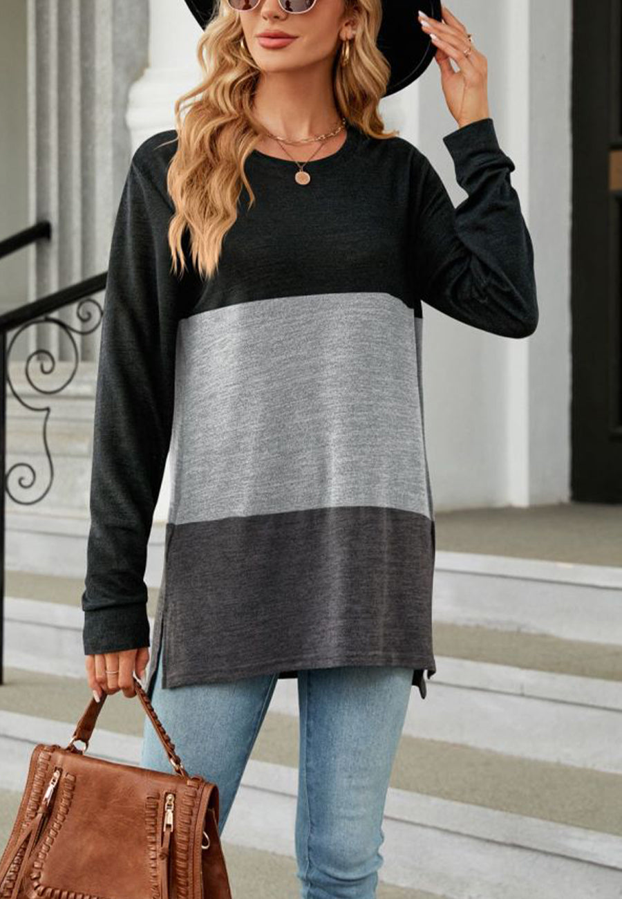 Suéter largo con aberturas laterales y diseño de bloques de color