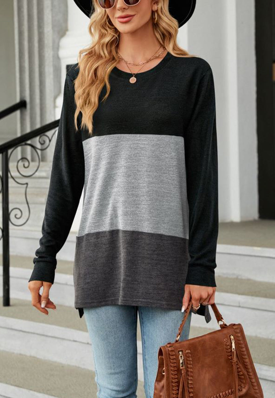 Suéter largo con aberturas laterales y diseño de bloques de color