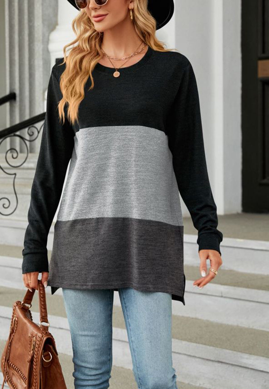 Suéter largo con aberturas laterales y diseño de bloques de color
