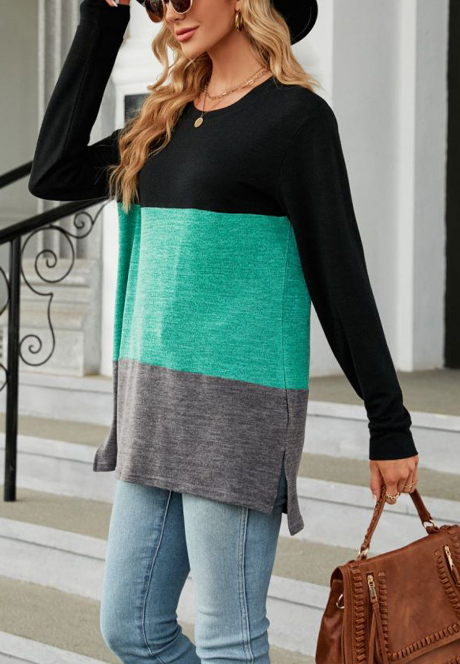 Suéter largo con aberturas laterales y diseño de bloques de color