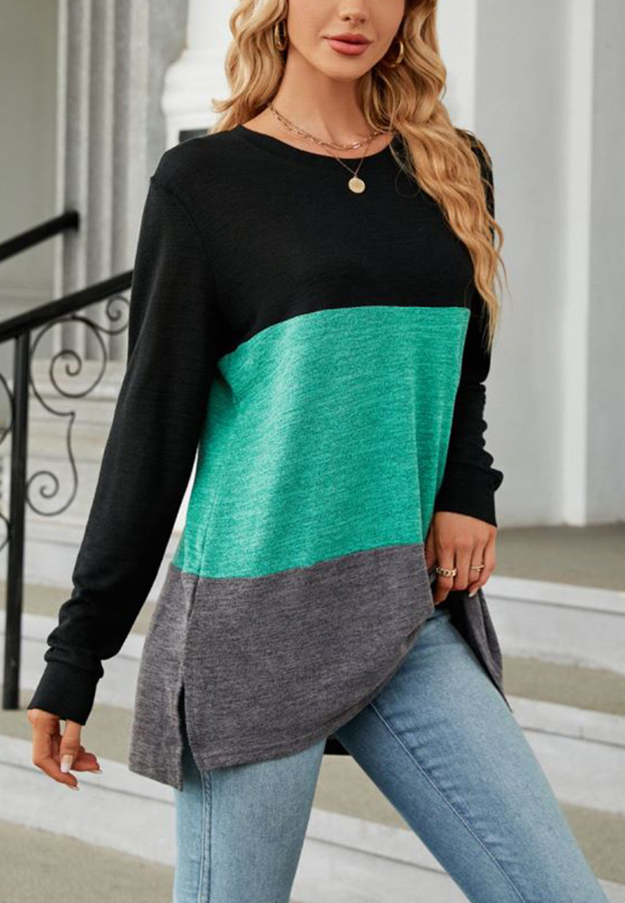 Suéter largo con aberturas laterales y diseño de bloques de color