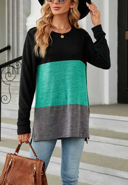 Suéter largo con aberturas laterales y diseño de bloques de color