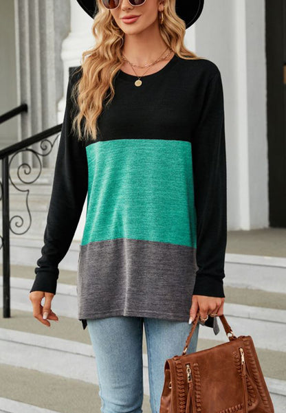 Suéter largo con aberturas laterales y diseño de bloques de color