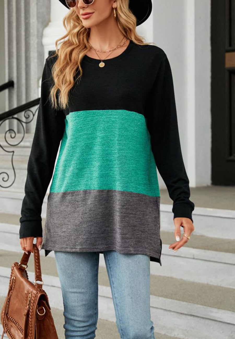 Suéter largo con aberturas laterales y diseño de bloques de color