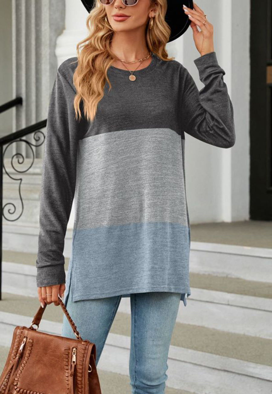 Suéter largo con aberturas laterales y diseño de bloques de color