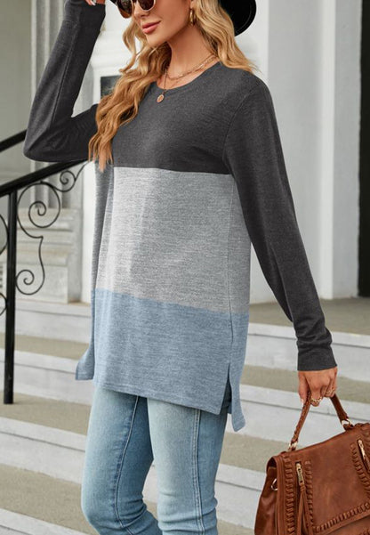 Suéter largo con aberturas laterales y diseño de bloques de color