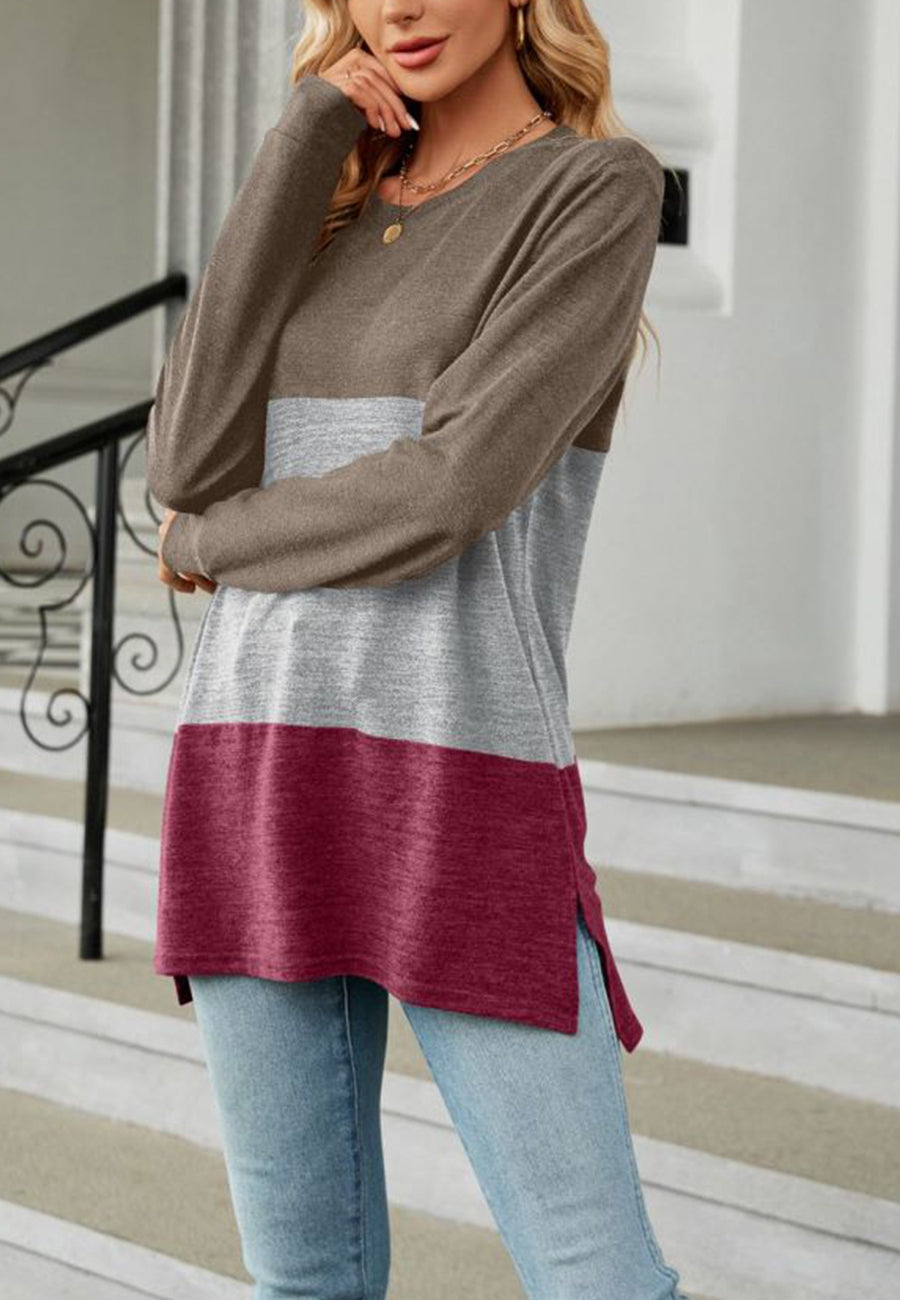 Suéter largo con aberturas laterales y diseño de bloques de color