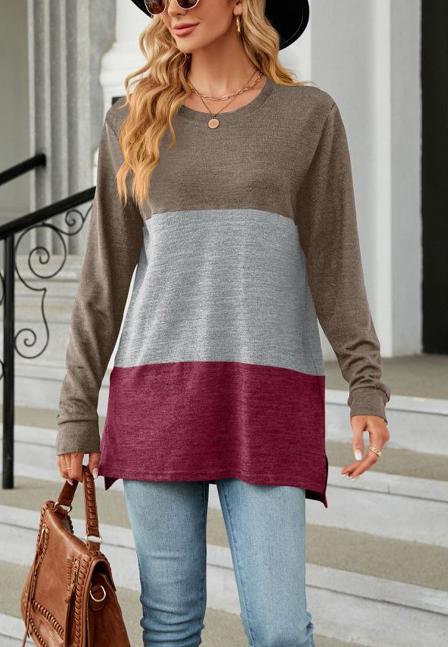 Suéter largo con aberturas laterales y diseño de bloques de color