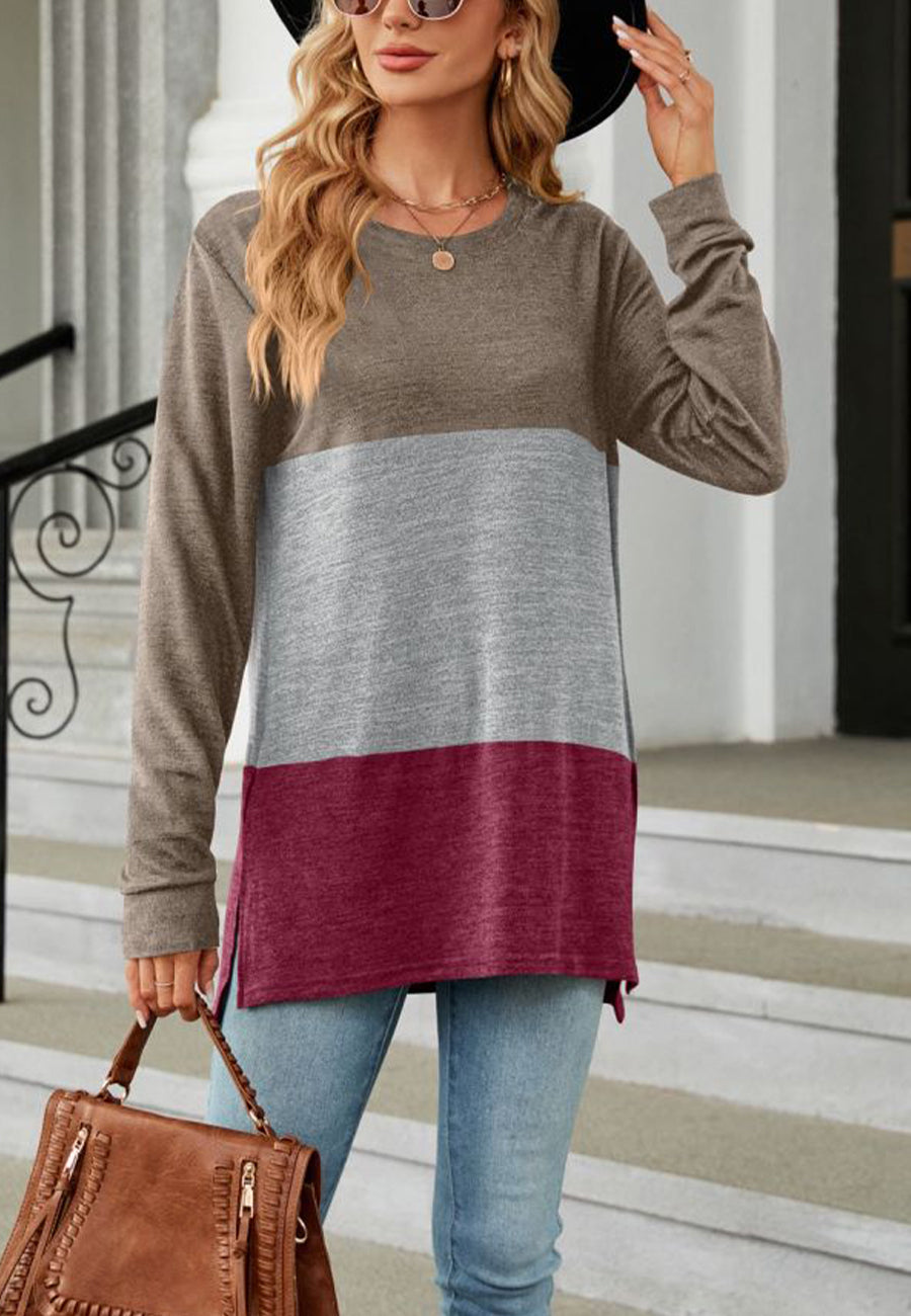 Suéter largo con aberturas laterales y diseño de bloques de color