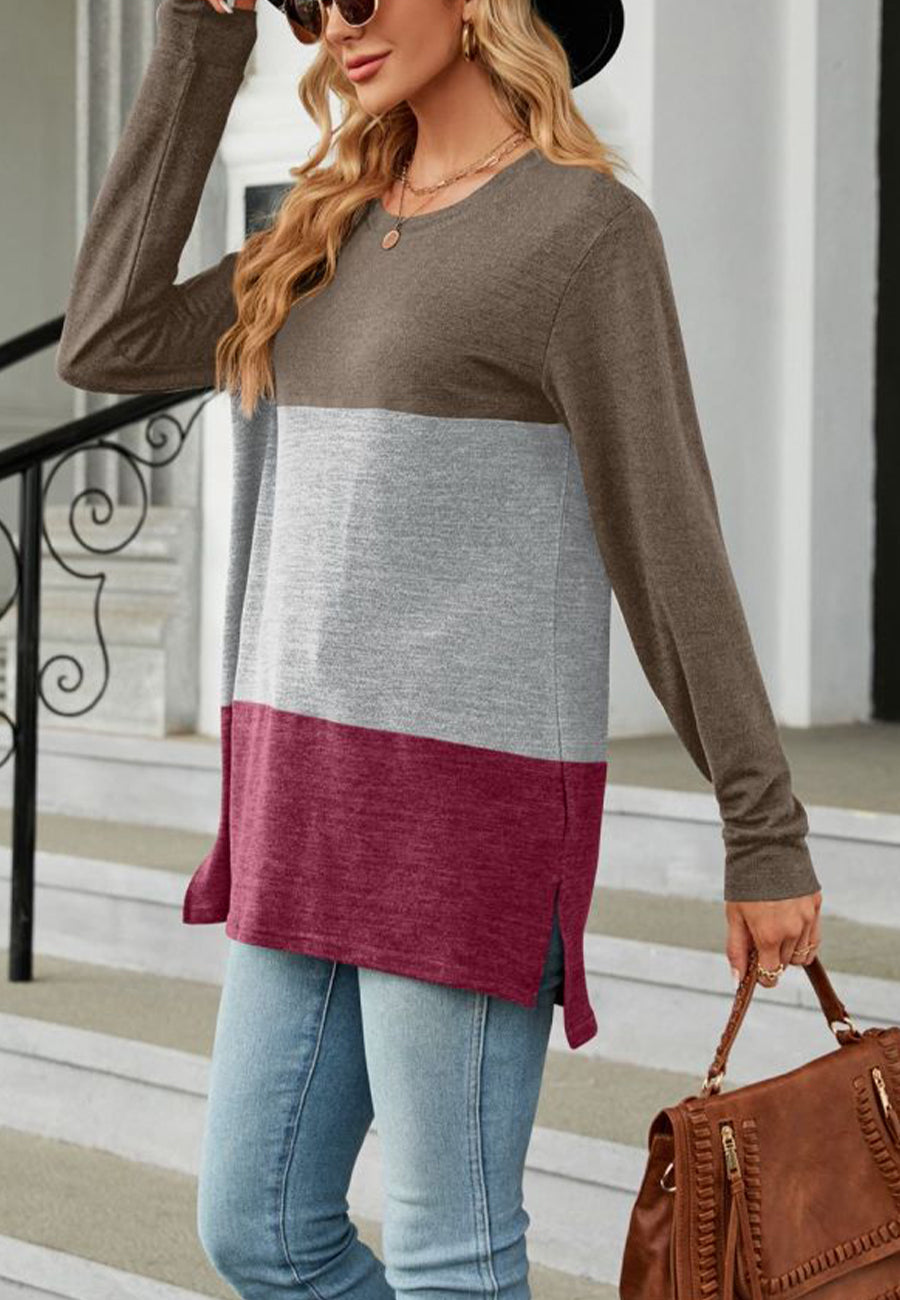 Suéter largo con aberturas laterales y diseño de bloques de color
