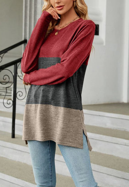 Suéter largo con aberturas laterales y diseño de bloques de color