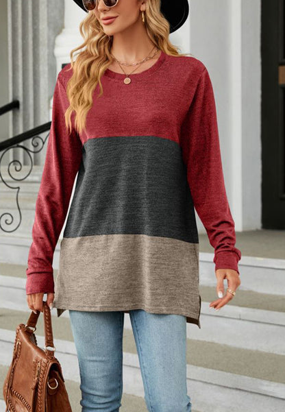Suéter largo con aberturas laterales y diseño de bloques de color