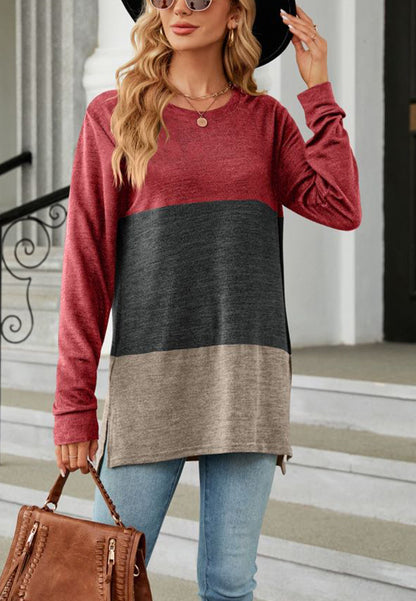 Suéter largo con aberturas laterales y diseño de bloques de color