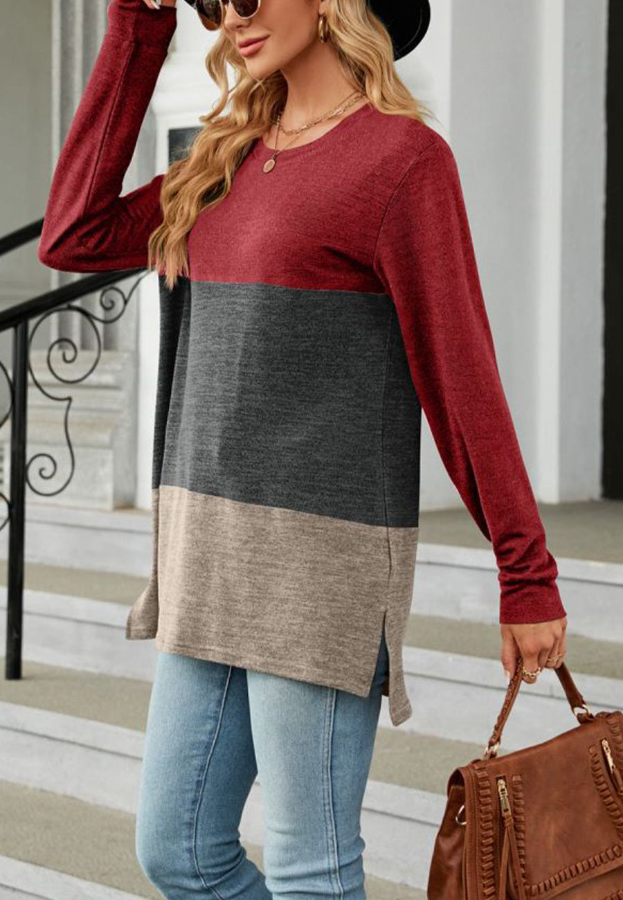Suéter largo con aberturas laterales y diseño de bloques de color
