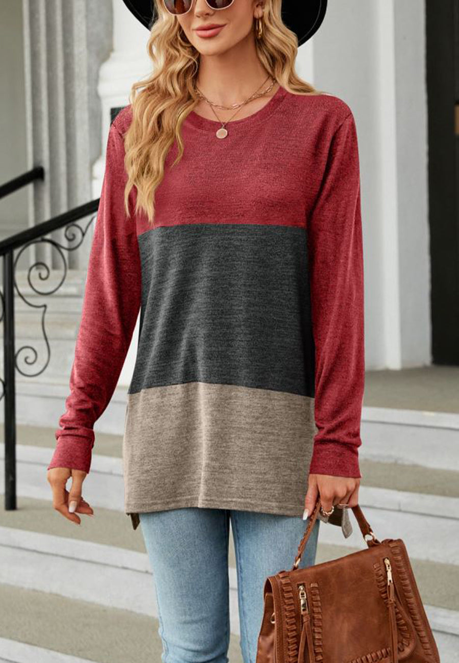 Suéter largo con aberturas laterales y diseño de bloques de color